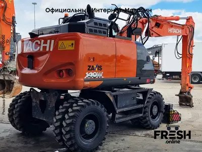 Колесный экскаватор Hitachi ZX140 W-6 4X4