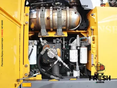 Колесный экскаватор Volvo EW 220 E