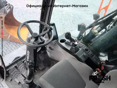 Колесный экскаватор Volvo EW 220 E