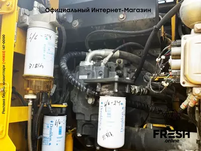 Колесный экскаватор Komatsu PW148-8