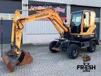 Колесный экскаватор Hyundai Robex 55W-9