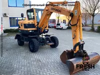 в рассрочку от 838 сум Колесный экскаватор Hyundai Robex 55W-9