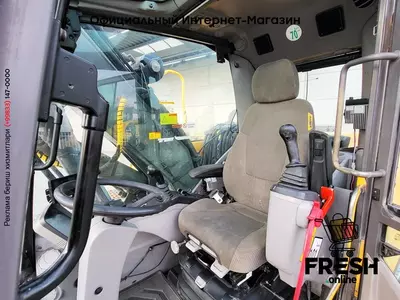 Колёсный экскаватор Volvo EW160 C 4X4