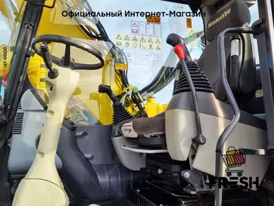 Колесный экскаватор Komatsu PW180