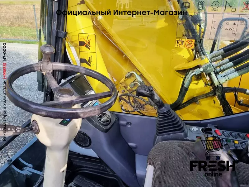 Колесный экскаватор Komatsu PW180