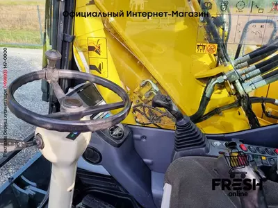 Колесный экскаватор Komatsu PW180