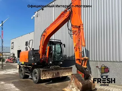Колесный экскаватор Hitachi ZX 140 W-5