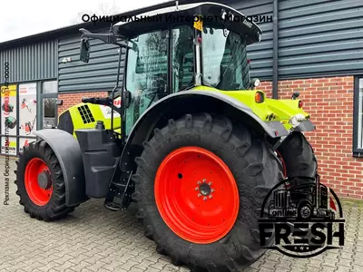 Колесный трактор Claas Arion 620 CIS