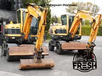 в рассрочку от 935 сум Колесный экскаватор Hyundai Robex 55W-9