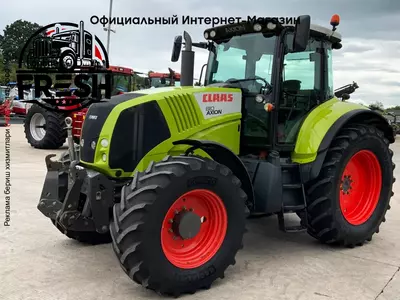 Колесный трактор Claas Axion 810 CMATIC