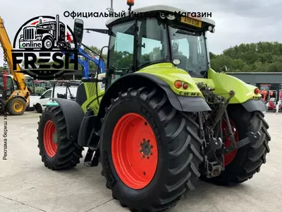 Колесный трактор Claas Axion 810 CMATIC