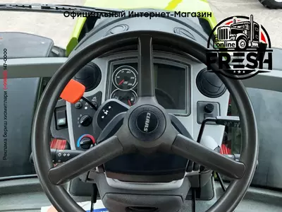 Колесный трактор Claas Axion 810 CMATIC