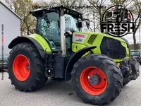 в рассрочку от 1 970 сум Колесный трактор CLAAS Axion 850 Cebis