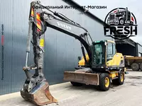 Колёсный экскаватор Volvo EW180D