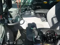 Колёсный экскаватор Volvo EW180D Тракторы