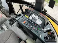 Экскаватор-погрузчик Caterpillar 444 E 4x4 - Погрузчики