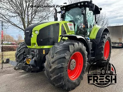 Колесный трактор Claas Axion 930