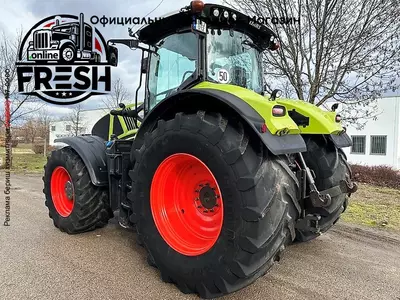 Колесный трактор Claas Axion 930