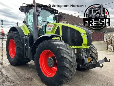 Колесный трактор Claas Axion 930