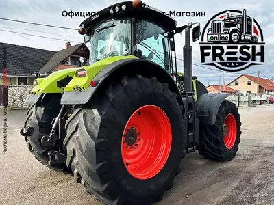 Колесный трактор Claas Axion 930