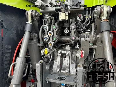 Колесный трактор Claas Axion 930