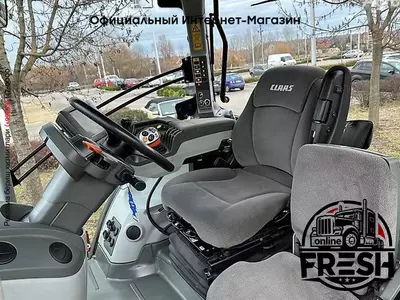 Колесный трактор Claas Axion 930