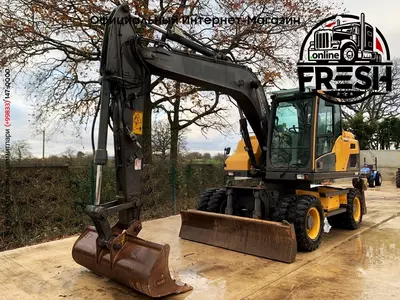 Колесные экскаватор Volvo EW140D