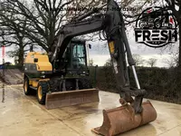 в рассрочку от 1 865 сум Колесные экскаватор Volvo EW140D