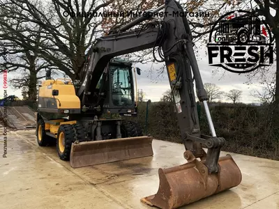 Колесные экскаватор Volvo EW140D