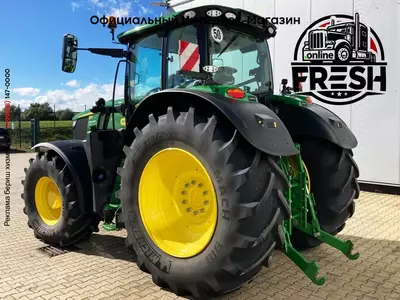 Колесный трактор John Deere 6R 215