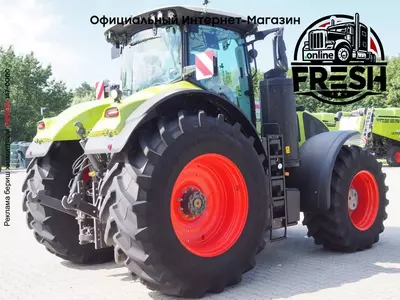 Колесный трактор Claas Axion 920 CMATIC