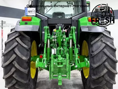 Колесный трактор John Deere 6810