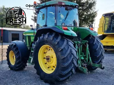 Колесный трактор John Deere 7710 AQ