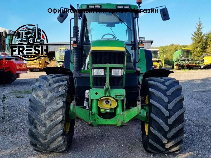 Колесный трактор John Deere 7710 AQ