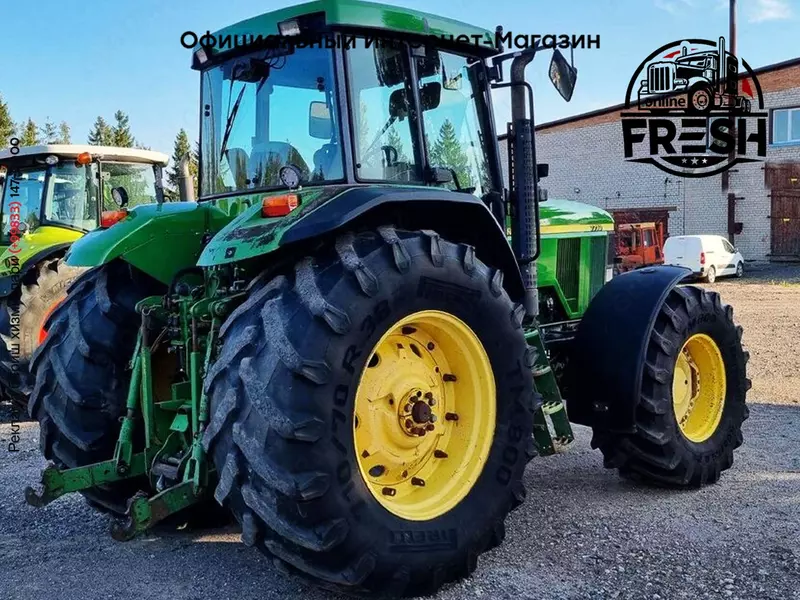 Колесный трактор John Deere 7710 AQ