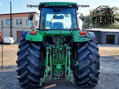 Колесный трактор John Deere 7710 AQ