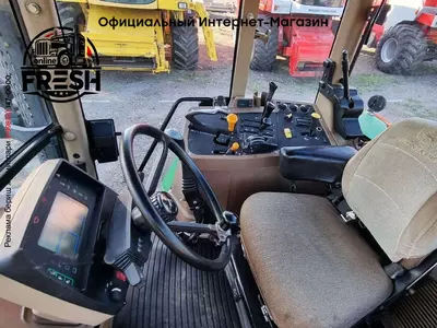Колесный трактор John Deere 7710 AQ