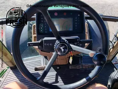 Колесный трактор John Deere 7710 AQ