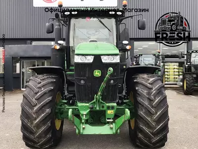 Колесный трактор John Deere 7310R