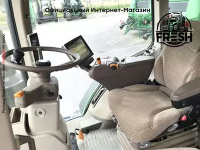 Колесный трактор John Deere 7310R