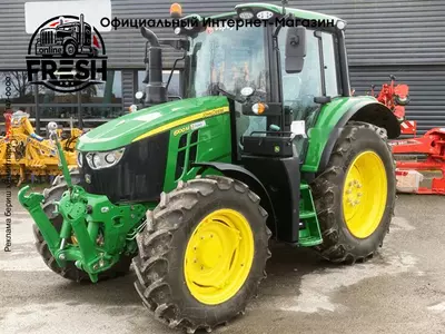 Колесный трактор John Deere 6100M