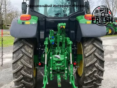 Колесный трактор John Deere 6100M