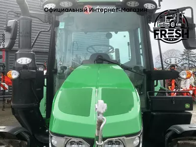 Колесный трактор John Deere 6100M