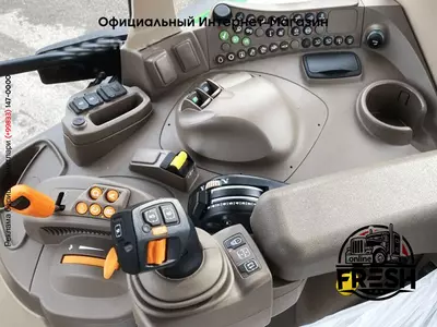 Колесный трактор John Deere 6100M