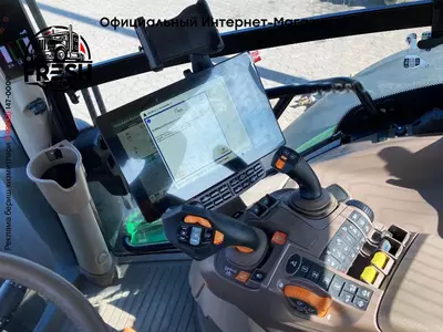 Колесный трактор John Deere 6R215