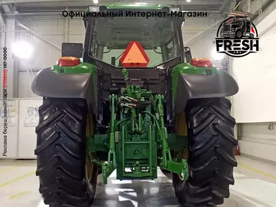 Колесный трактор John Deere 6320