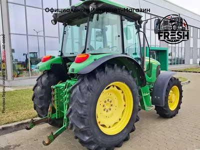 Колесный трактор John Deere 5090M