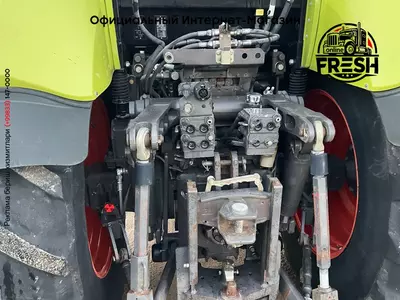 Колесный трактор Claas Axion 830