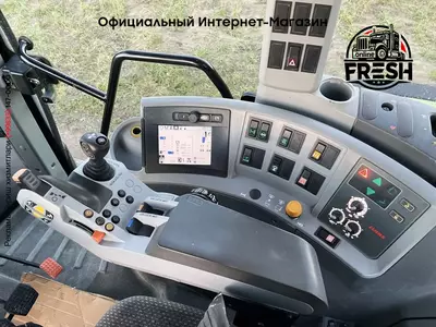 Колесный трактор Claas Axion 830