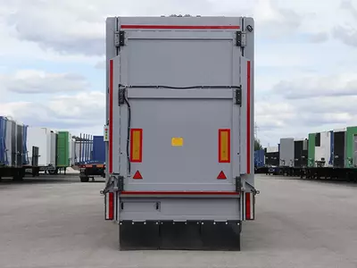 Yirik hayvonlarni tashish uchun polupritsep Tonar-9827 (gidrolift bilan)